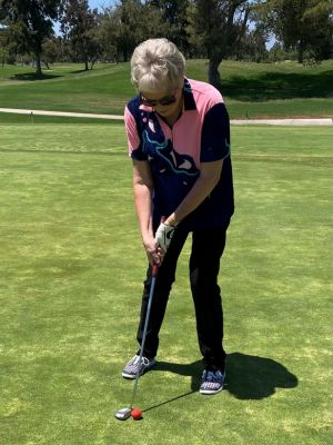 Bev Mast golfing for the first time following her total hip replacement procedure.