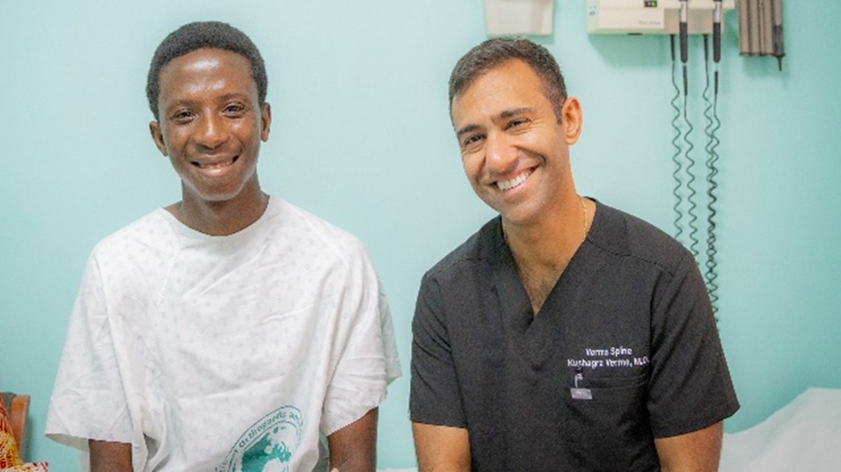 Dr. Verma with Spine patient