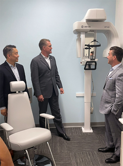 Pacific Dental Services Founder and CEO, Stephen E. Thorne IV, joins MemorialCare's President and CEO, Barry Arbuckle, Ph.D., and CEO of MemorialCare Medical Group and Greater Newport Physicians, David Kim, on a tour of the innovative dental office.